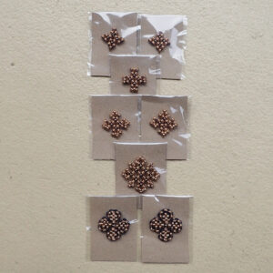 Ravattulan viitan pronssispiraalikoristesetti